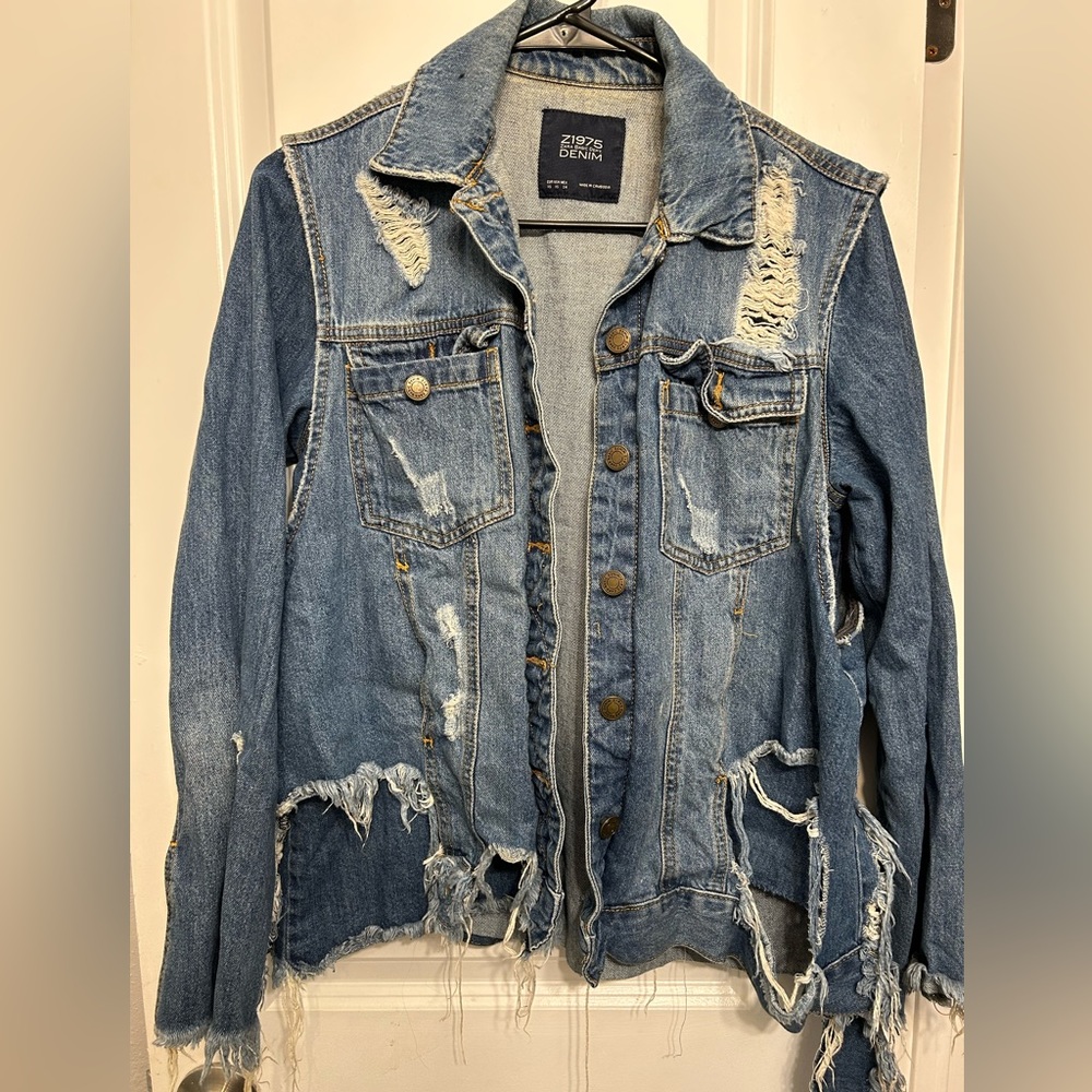 Distressed denim jacket